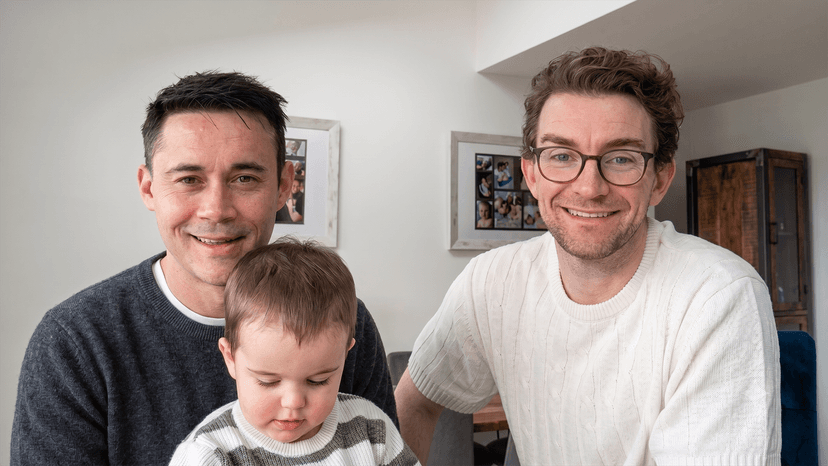 A family portrait of Chris, Billy, and their son Cody